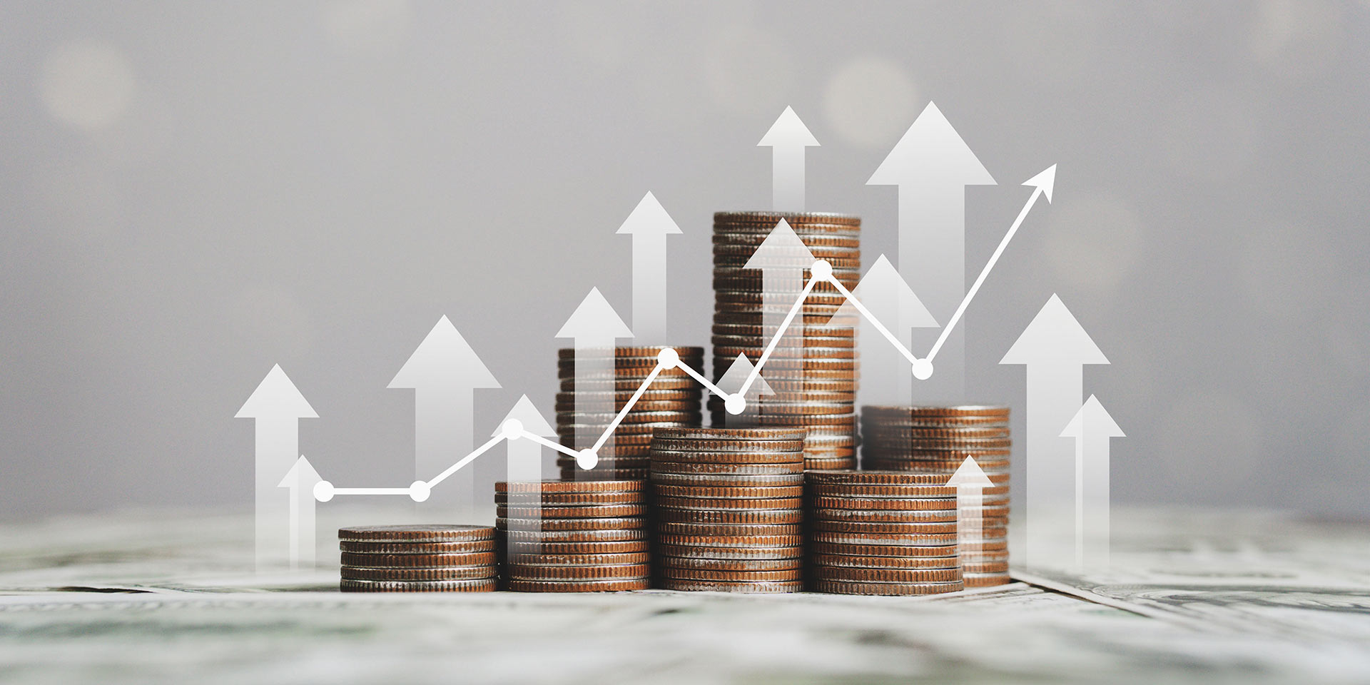 stack of silver coins with trading chart in financial concepts and financial investment business stock growth. symbolbild sparen o anlegen