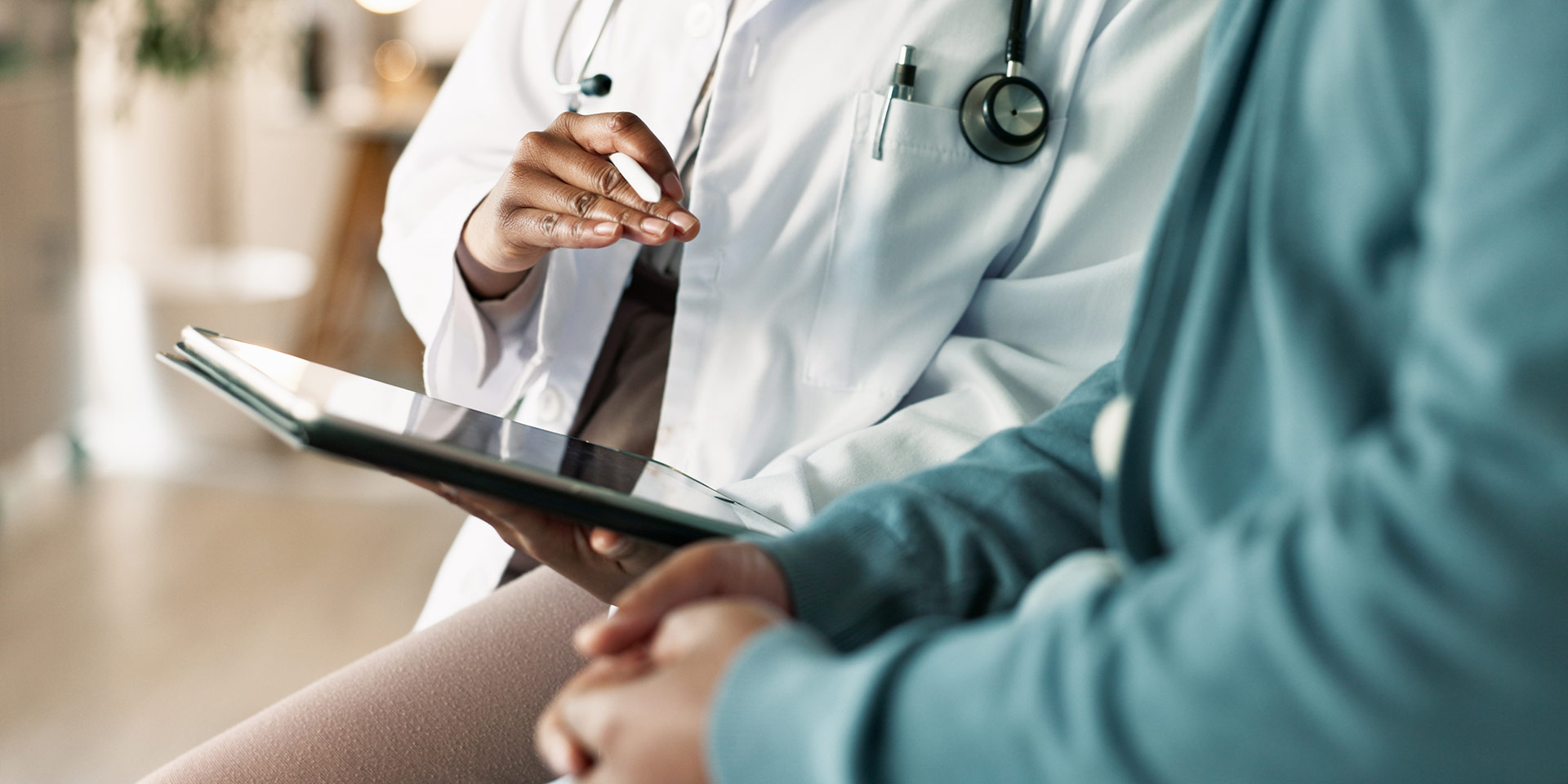 tablet, hands and patient with doctor in hospital for consultation with cold, flu and sickness. digital technology, conversation and person with healthcare rker for medical diagnosis in clinic