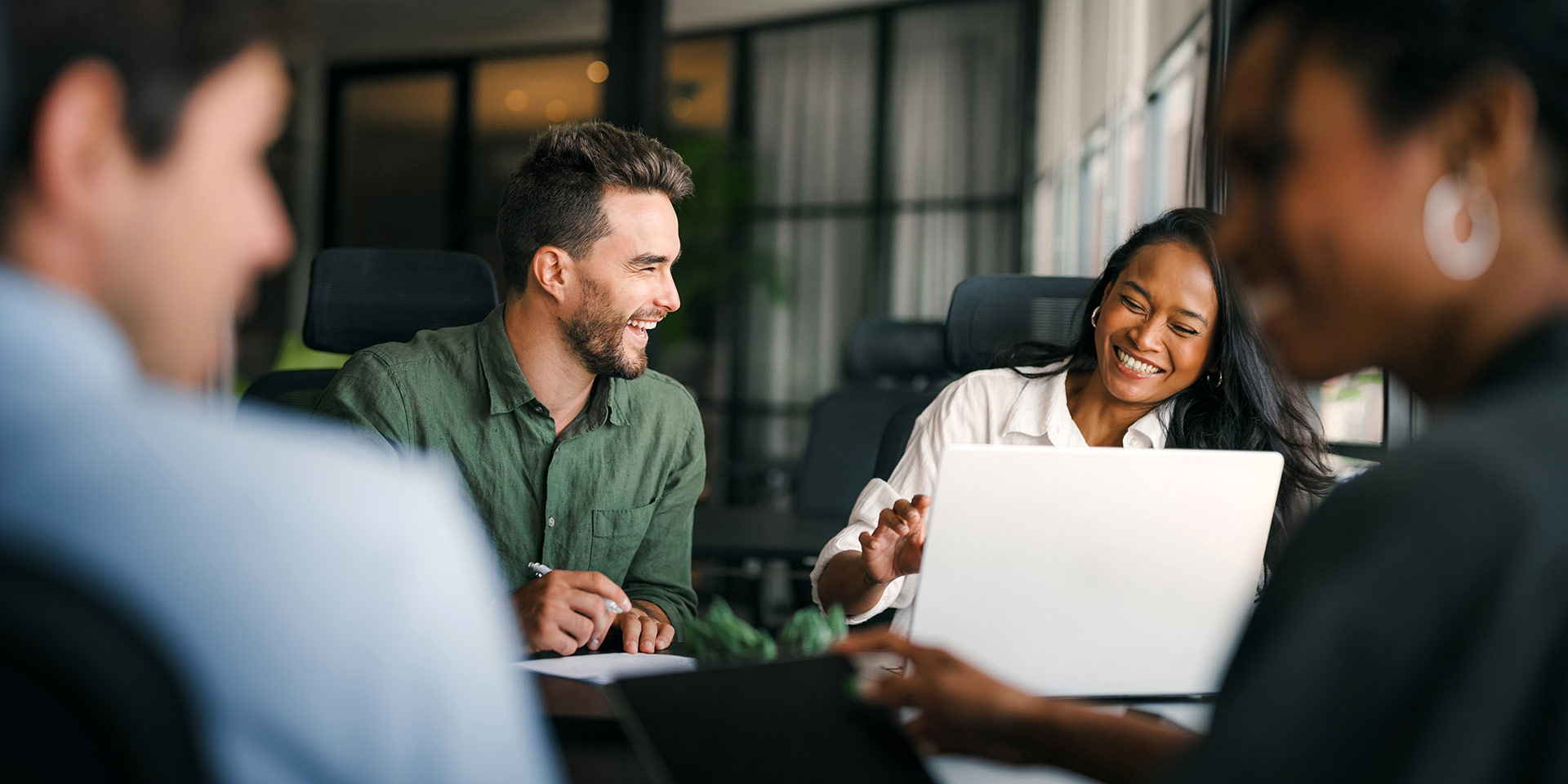 group of young multi-ethnic startup business team collaborating on project in mon office, ki