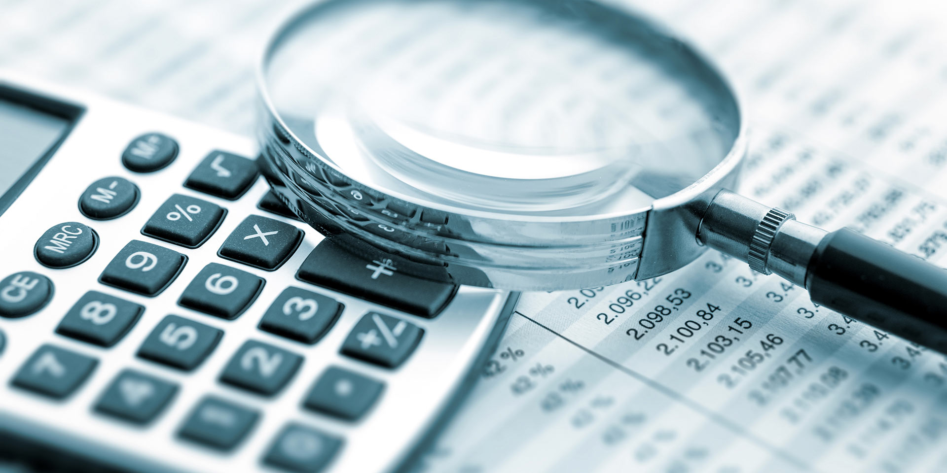 magnifying glass on financial chart, controlling